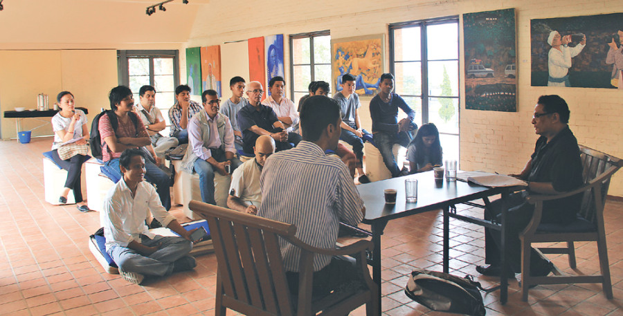 Discussing Paubha painting with Lok Chitrakar