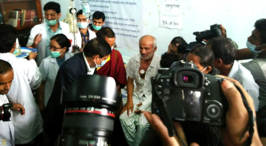 Dr KC breaks fast, drinks juice offered by patient
