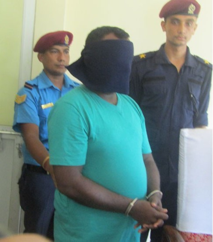 Fugitive Indian serial killer held from TIA