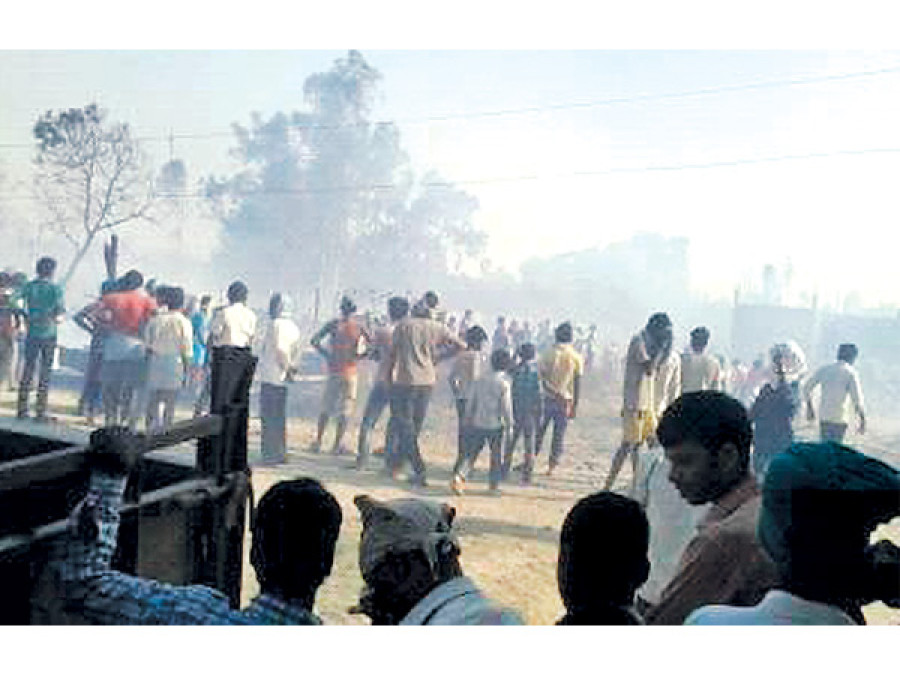 Woman dies as fire guts nearly 300 houses, sheds