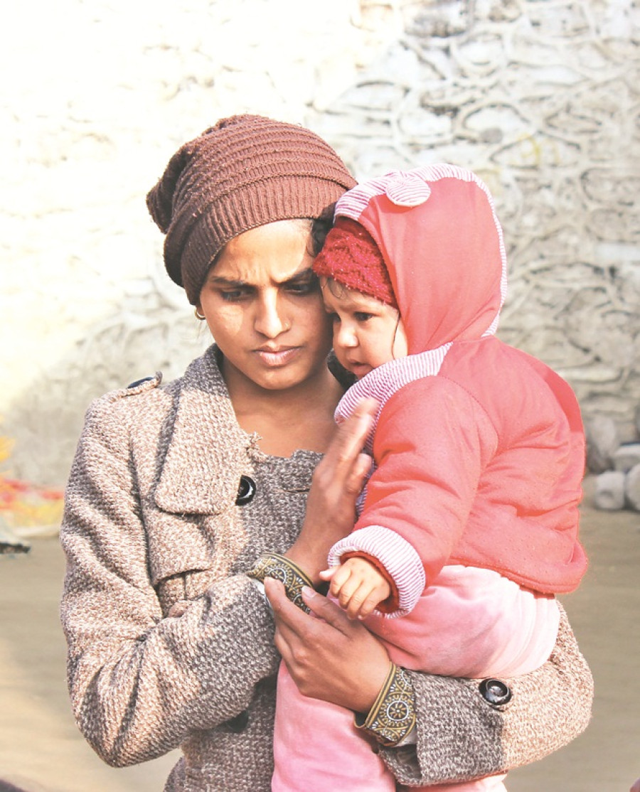 Young mother in prison with two daughters