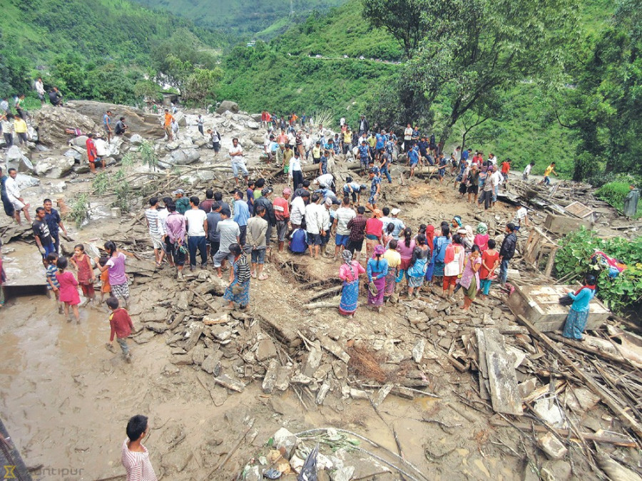 Landslide drives out 25 families in Dhading village