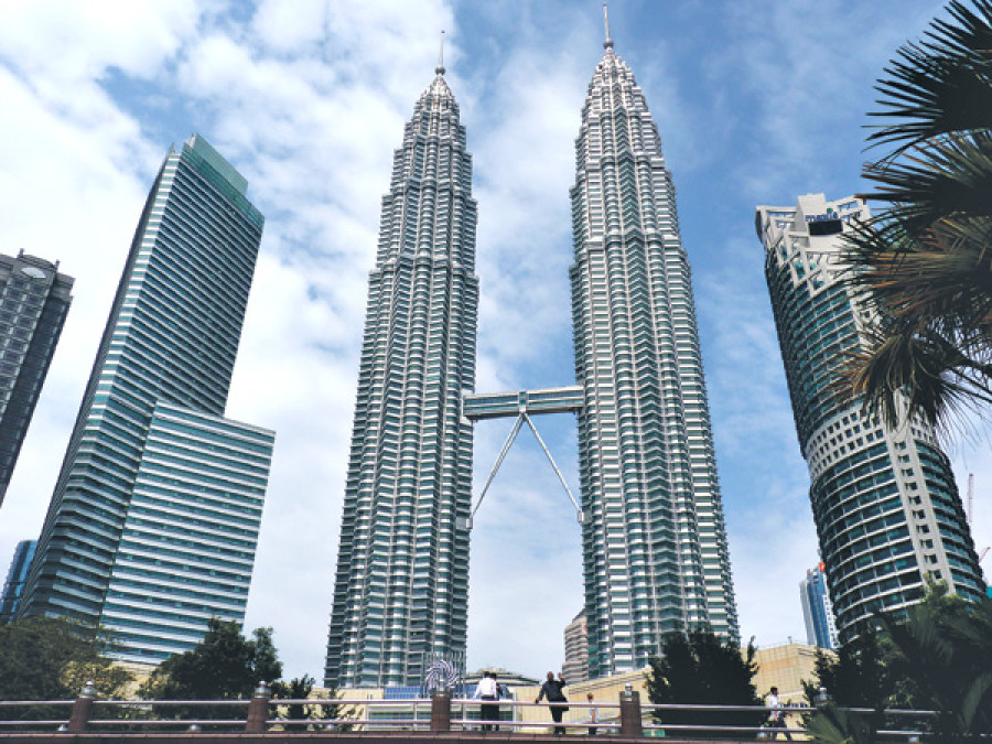 Malaysia puts temporary ban on new migrant workers
