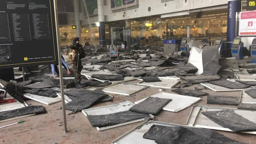 Brussels Zaventem airport and metro attacks 'kill at least 13'