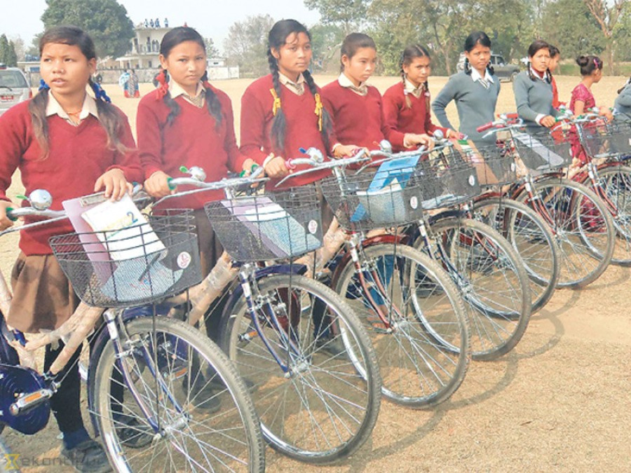 27 Tharu girls get bicycles