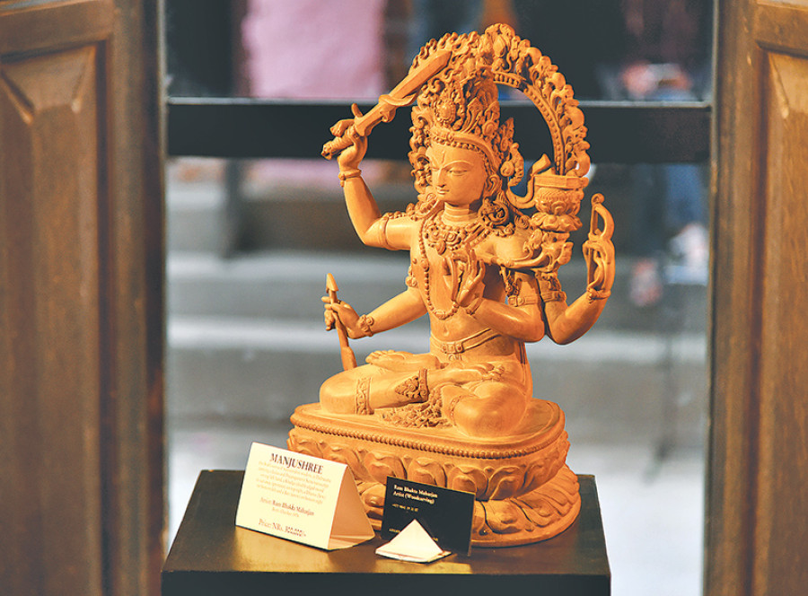 Traditional woodcarvings on display at Newa Chen