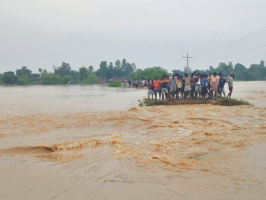 At least 30 killed in floods, landslides
