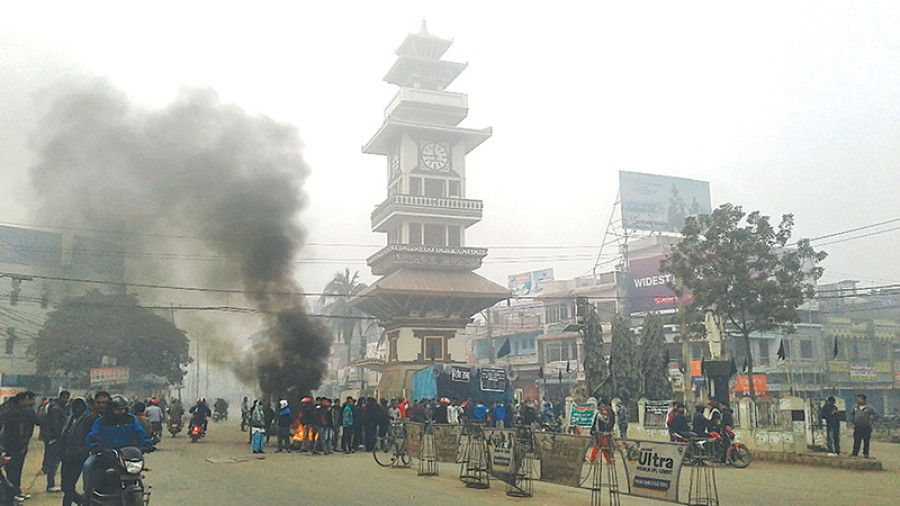 Protesters burn tyres and damage vehicles