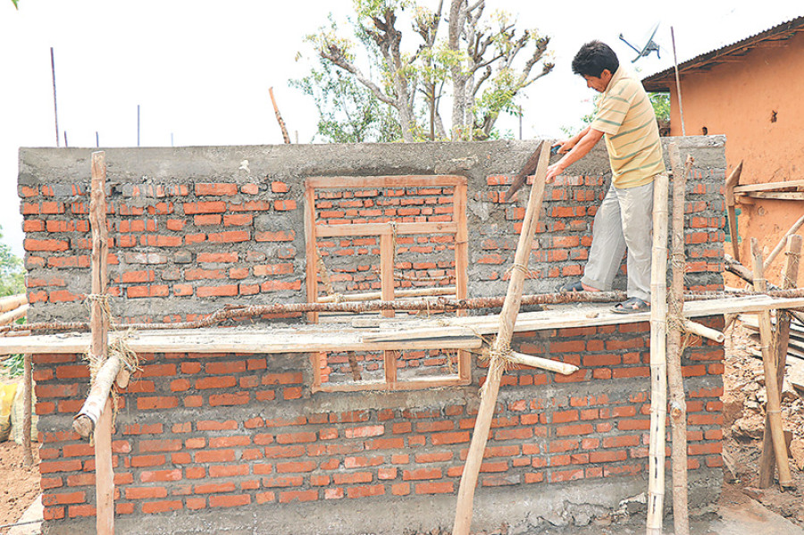 Displaced families still live in temporary huts
