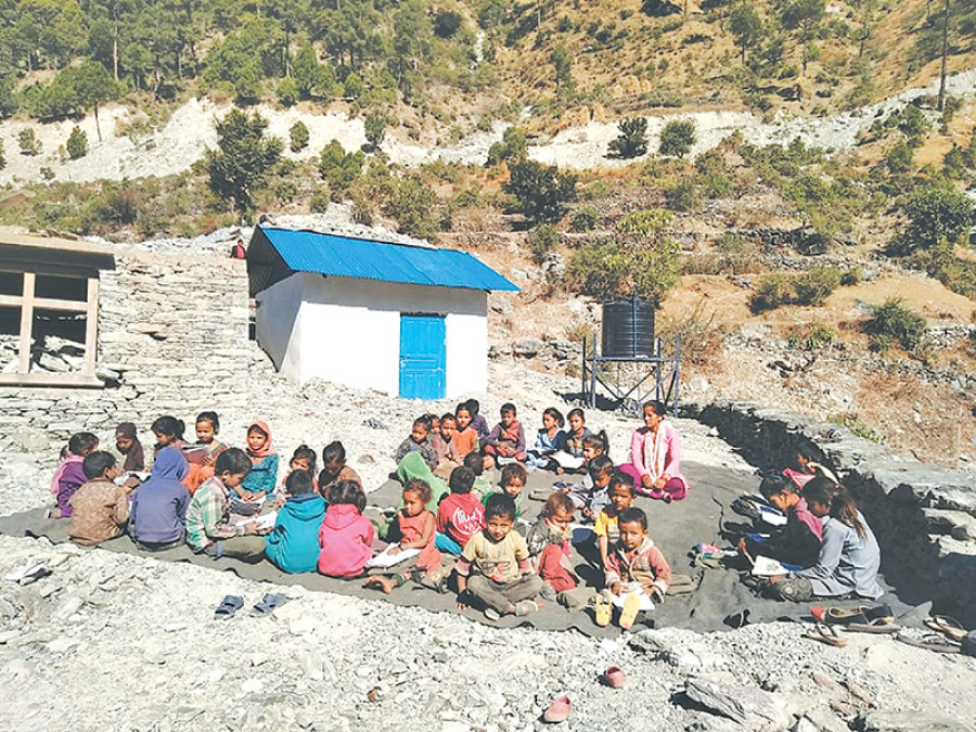 Talkot students study in open after landslide destroys school