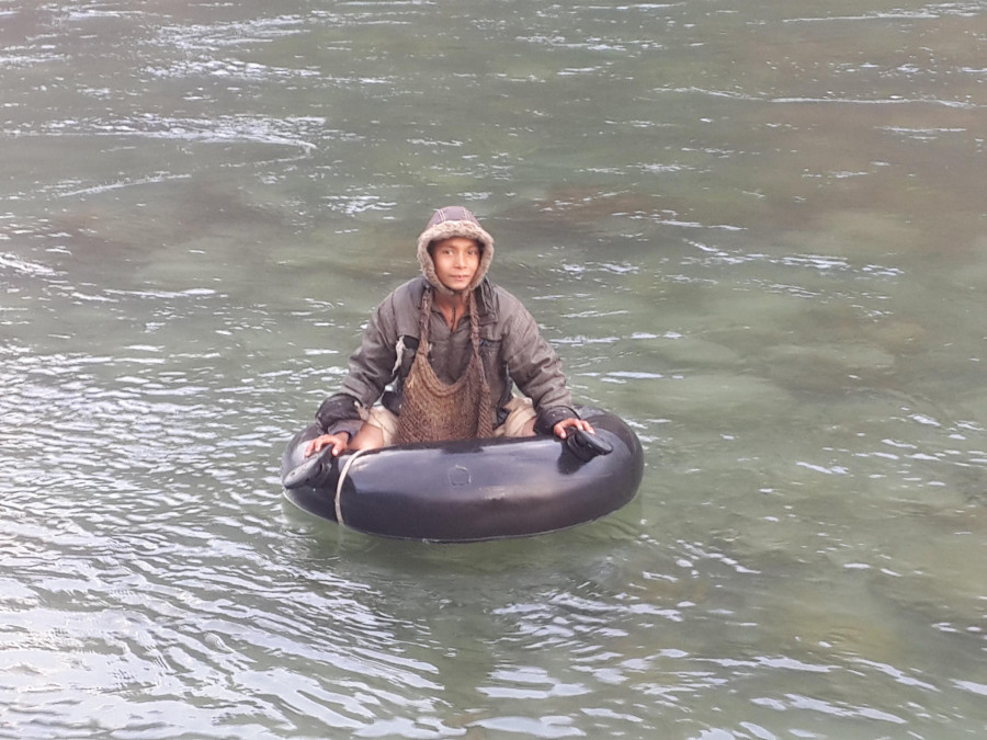 Baphi villagers rely on boats and tubes to cross Seti