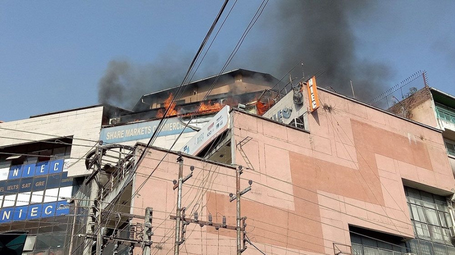 Fire at share market building in Putalisadak