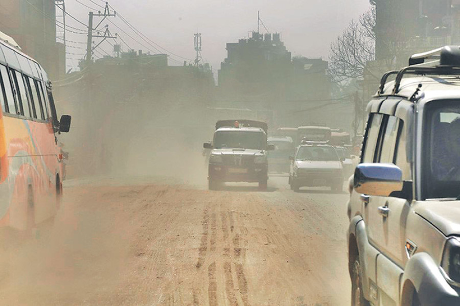Crews lay hume pipes on both sides of road