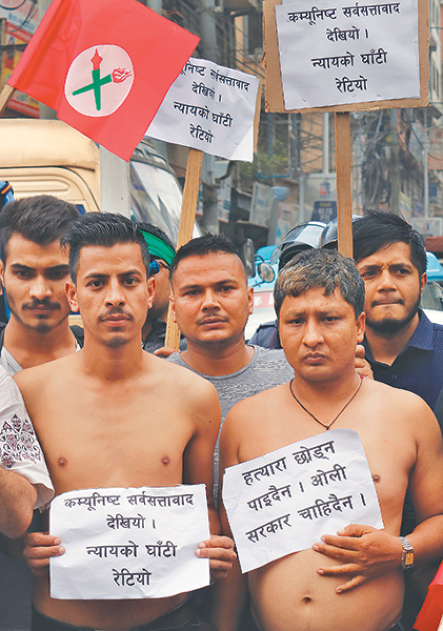 Dhungel freed despite criticism