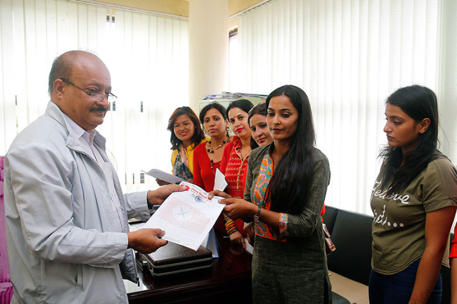 Durga Prasai faces slander charge