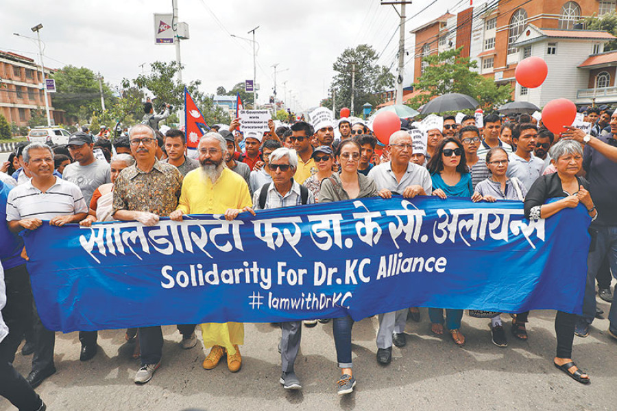 Thousands rally in support of Dr KC