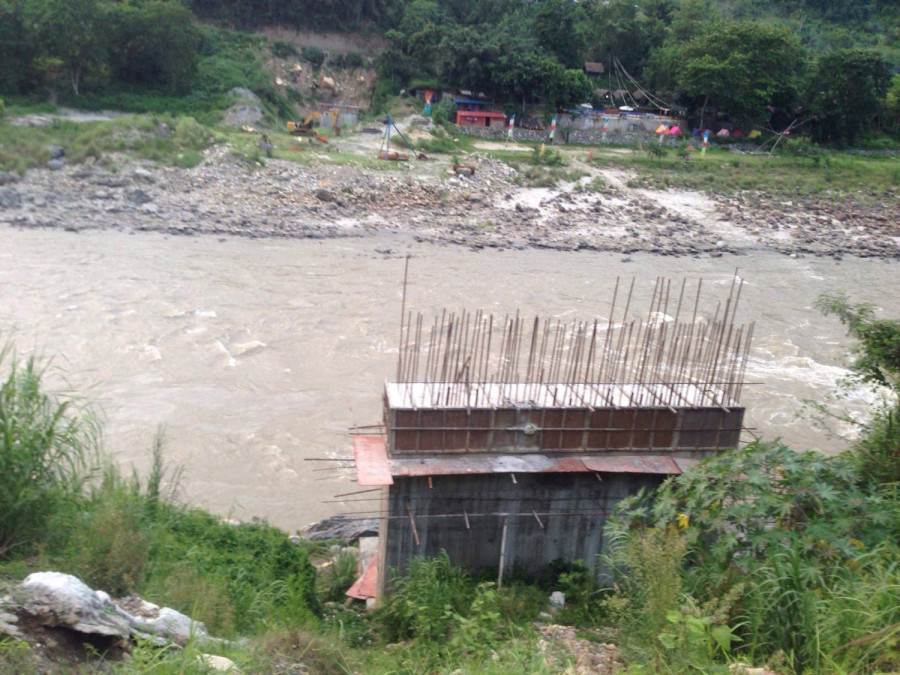 Pappu Construction leaves a bridge incomplete over the Trishuli river