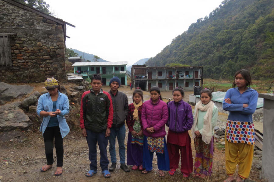Rai woman educating Chepang children in Chitwan