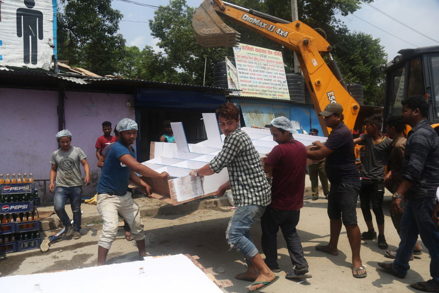 After public outcry, authorities demolish illegal structures