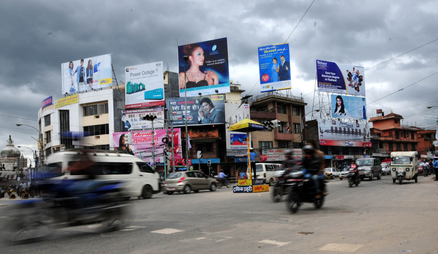 Kathmandu is plastered with hideous hoarding boards and the city can't do anything about them