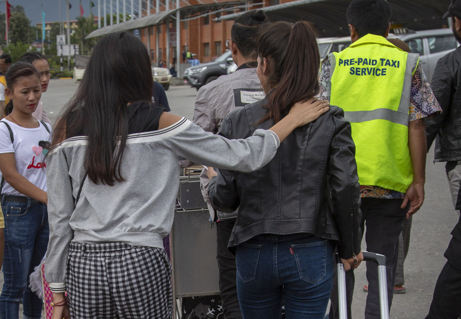 Nepali women duped in China have returned home, but their ordeal is not over yet