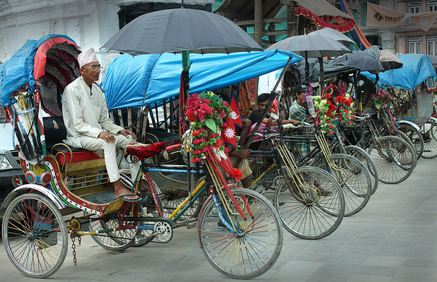 Pushed to the curb, Kathmandu’s rickshaw pullers are the last of a dying profession