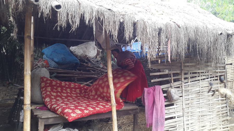 Impoverished families in Sarlahi depend on hay to combat the cold