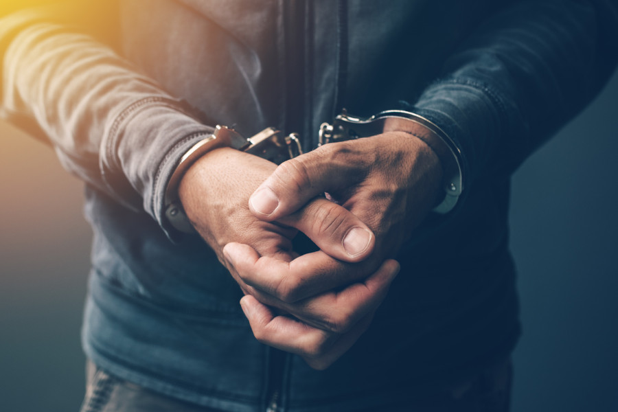Police arrest bank hacker fugitive
