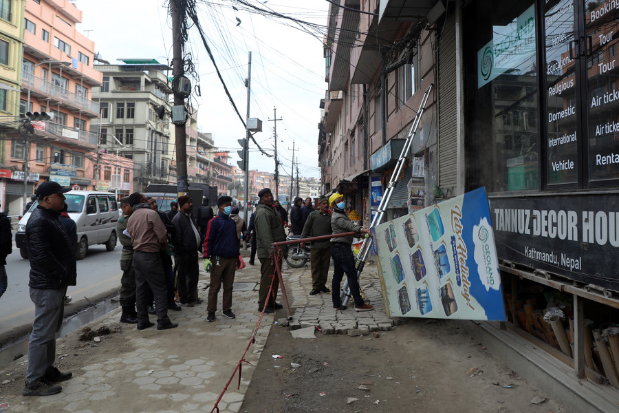 Kathmandu Metropolitan City intensifies campaign to remove hoarding boards from city