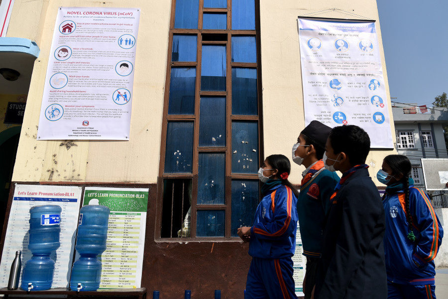 Keep using face masks until vaccines become available, experts say