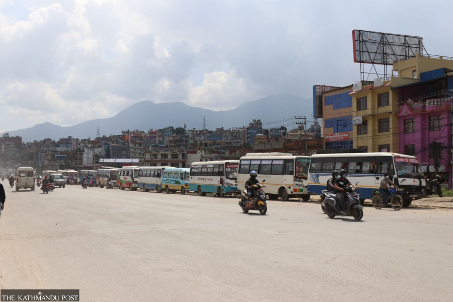 Bus operators stage protest after police crackdown against overcharging