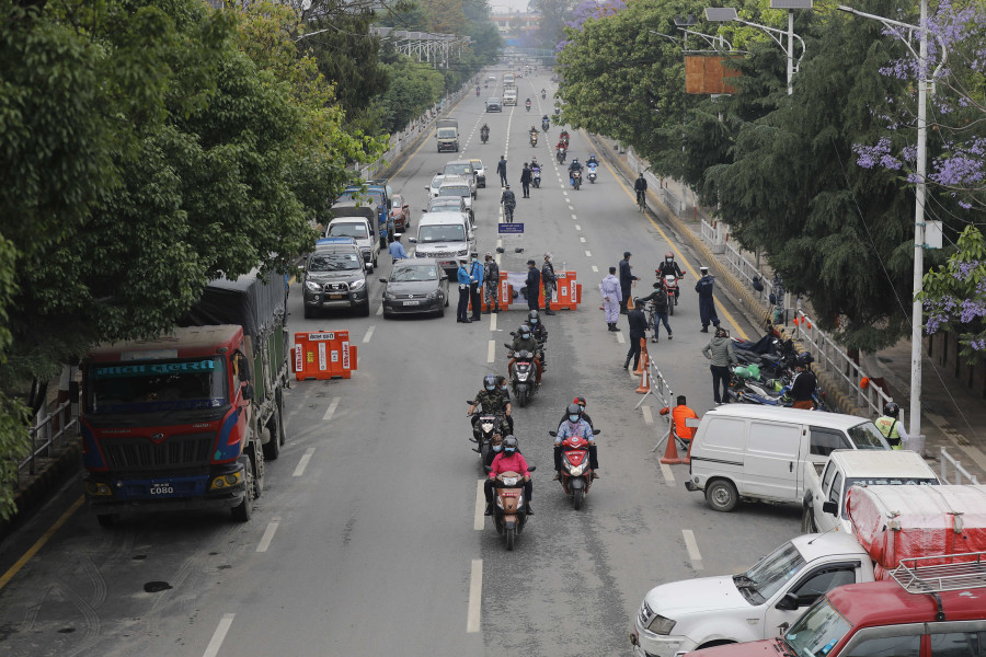 Curbs need gradual lifting, with other measures to control pandemic, experts say