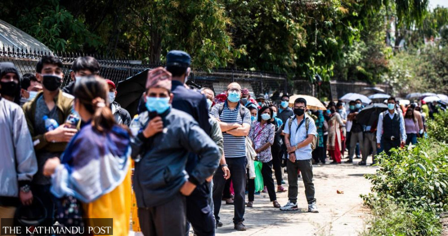 Crowds at vaccine centres risk further spread of the virus, doctors warn