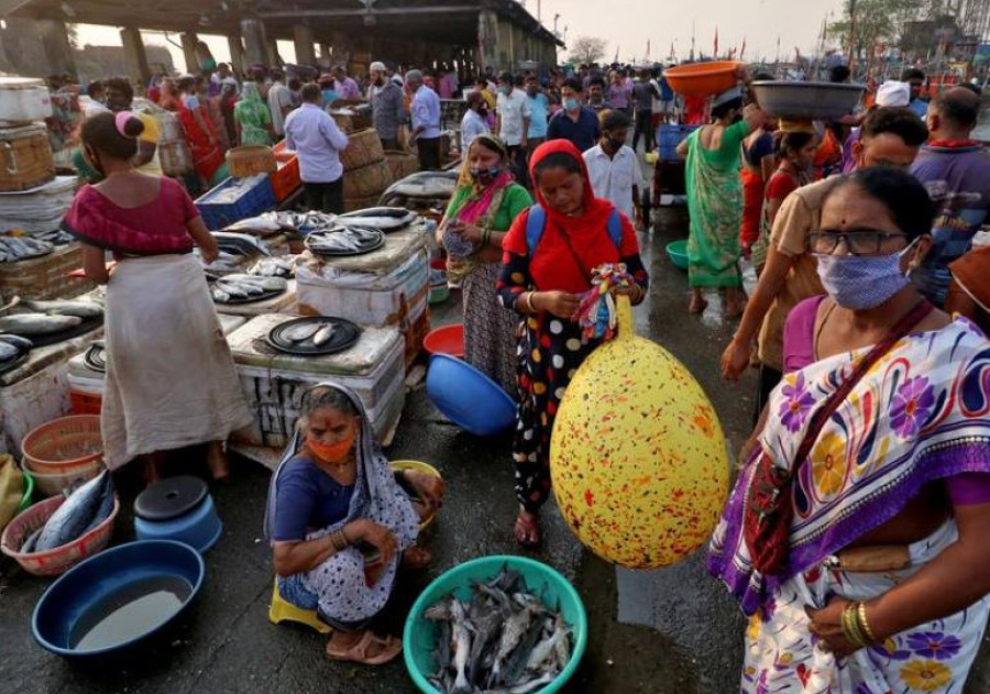 India's coronavirus tally overtakes Brazil; thousands join ritual bath
