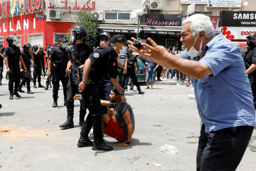Tunisian president ousts government in move critics call a coup