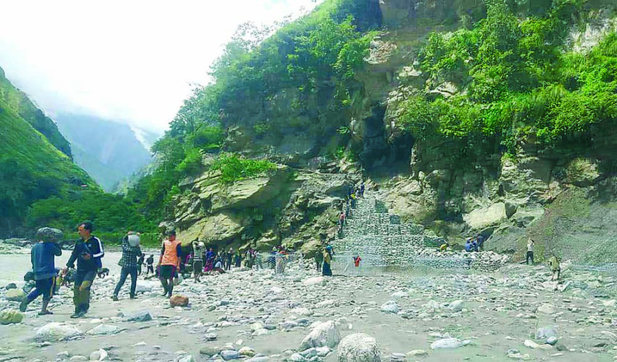 Cantilever bridge left unused after floods swept away approach way