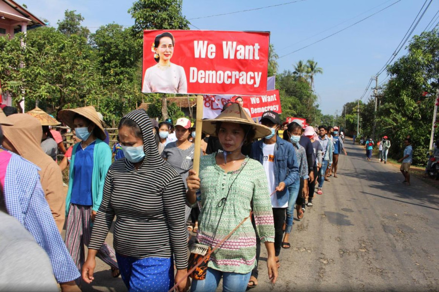 Myanmar protesters paint Yangon red, defying bloody army crackdown