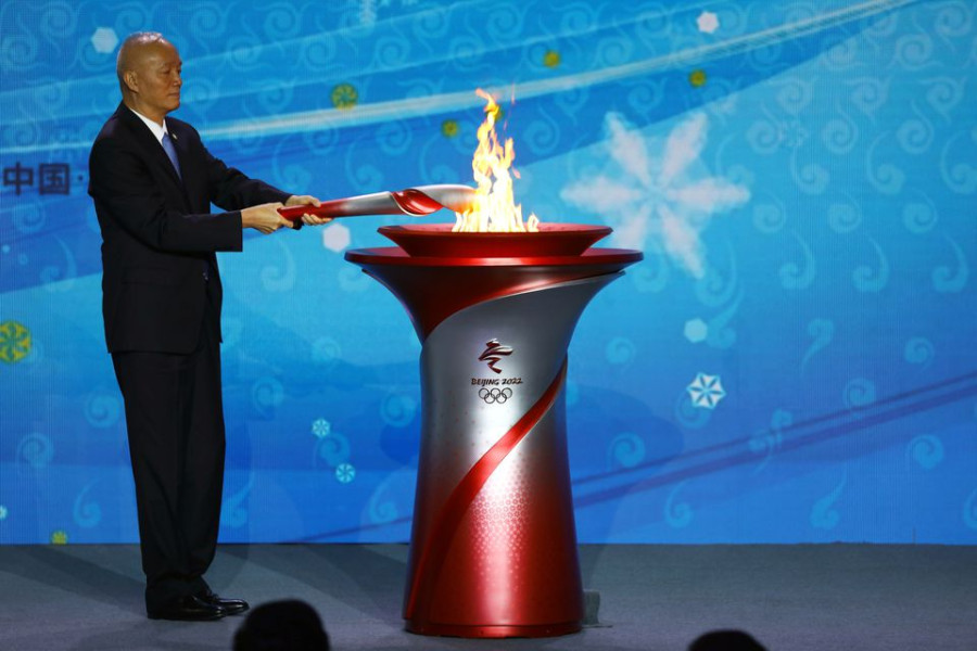 Beijing lights flame, to be first city to host summer, winter games