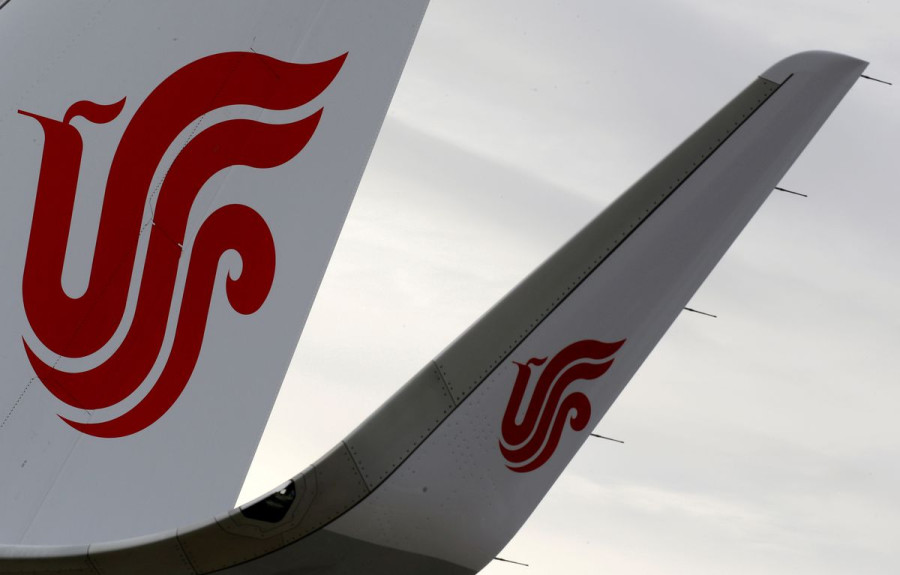 China expected to keep curbs on int'l flights throughout first half of 2022