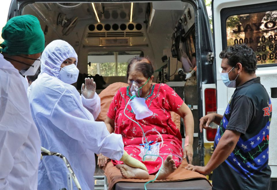India’s Covid tally passes 25 million as cyclone complicates efforts in Modi's state