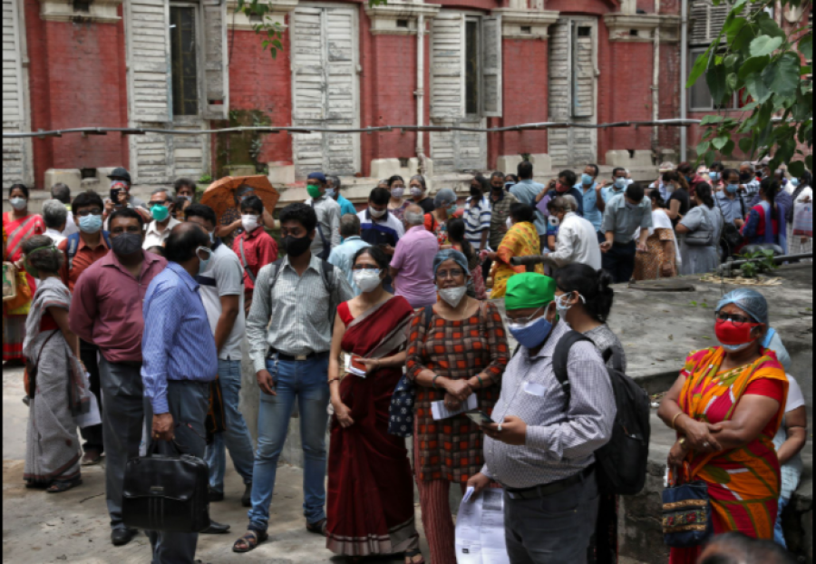 India’s virus cases decline, but WHO expert says positive tests ominously high