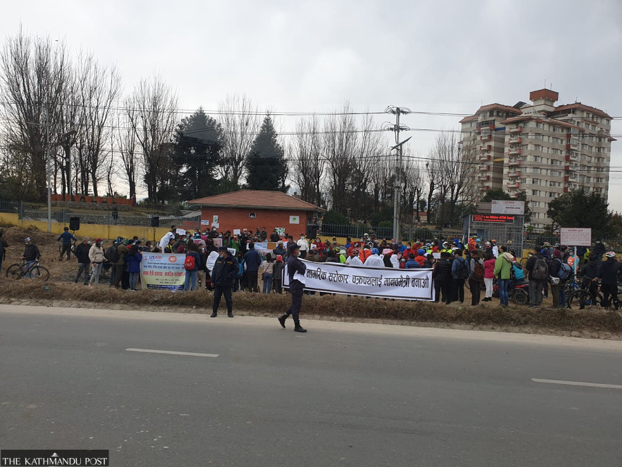 USAID logo seen in civic march on Chinese-implemented Ring Road project. Nepalis see the geopolitical side of it