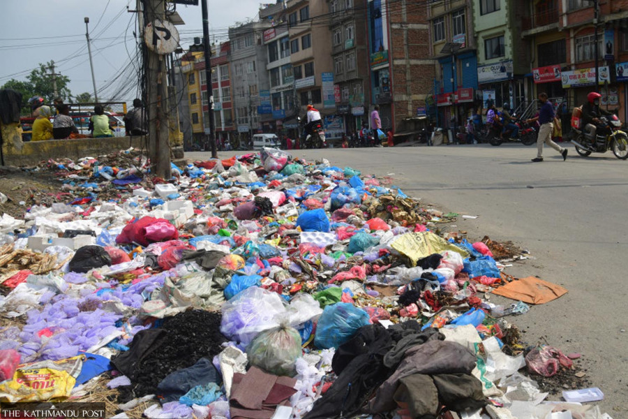 Garbage piles up on Valley streets, again