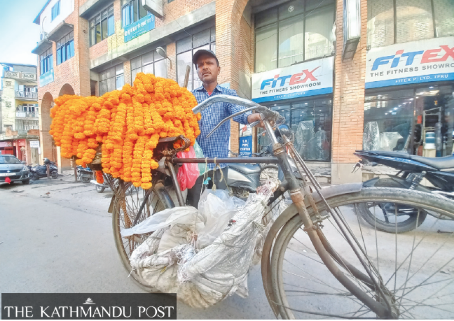 Flower vendors turn roaming salespersons as Kathmandu bans sidewalk shops