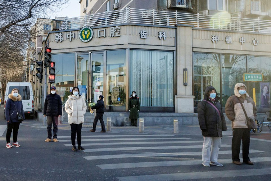 China softens tone on Covid severity after protests