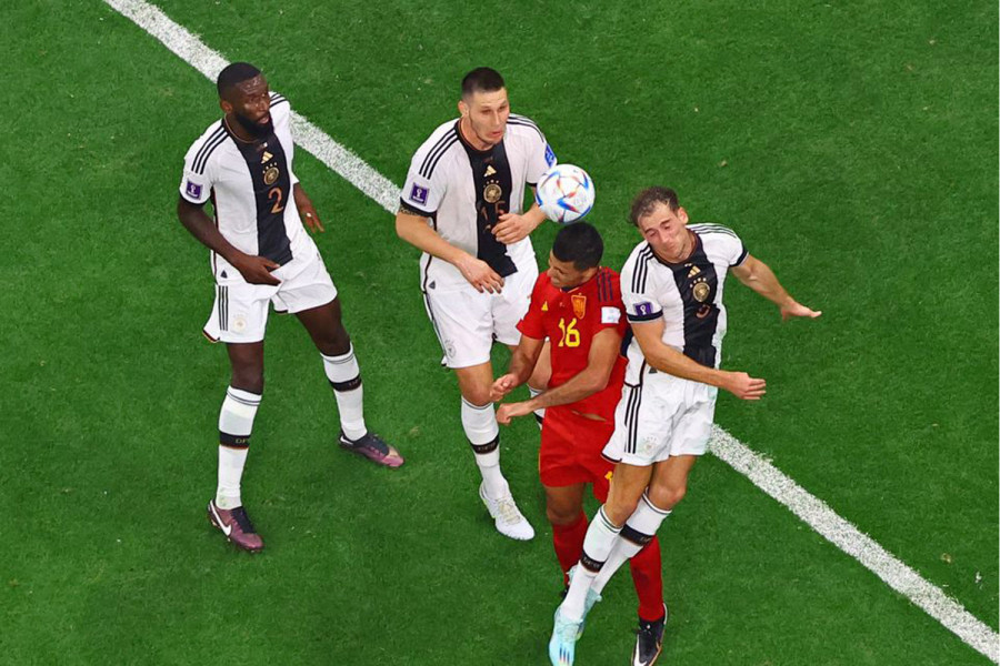 Germany breath life into World Cup campaign in battling draw with Spain