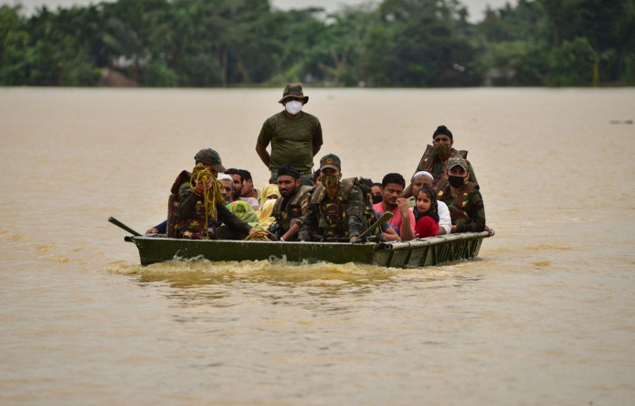 Bangladesh, India race to help millions stranded in deadly flooding