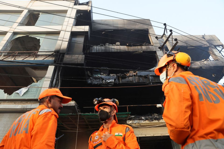 Building fire kills 27 in New Delhi, police arrest company owners