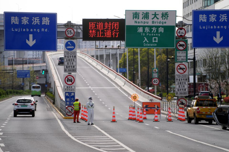 Shanghai tightens Covid lockdown on second day of curbs