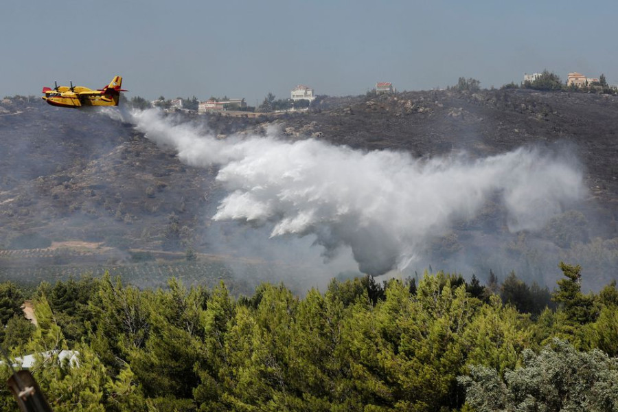 Wildfires rage across Europe as climate alarm sounded
